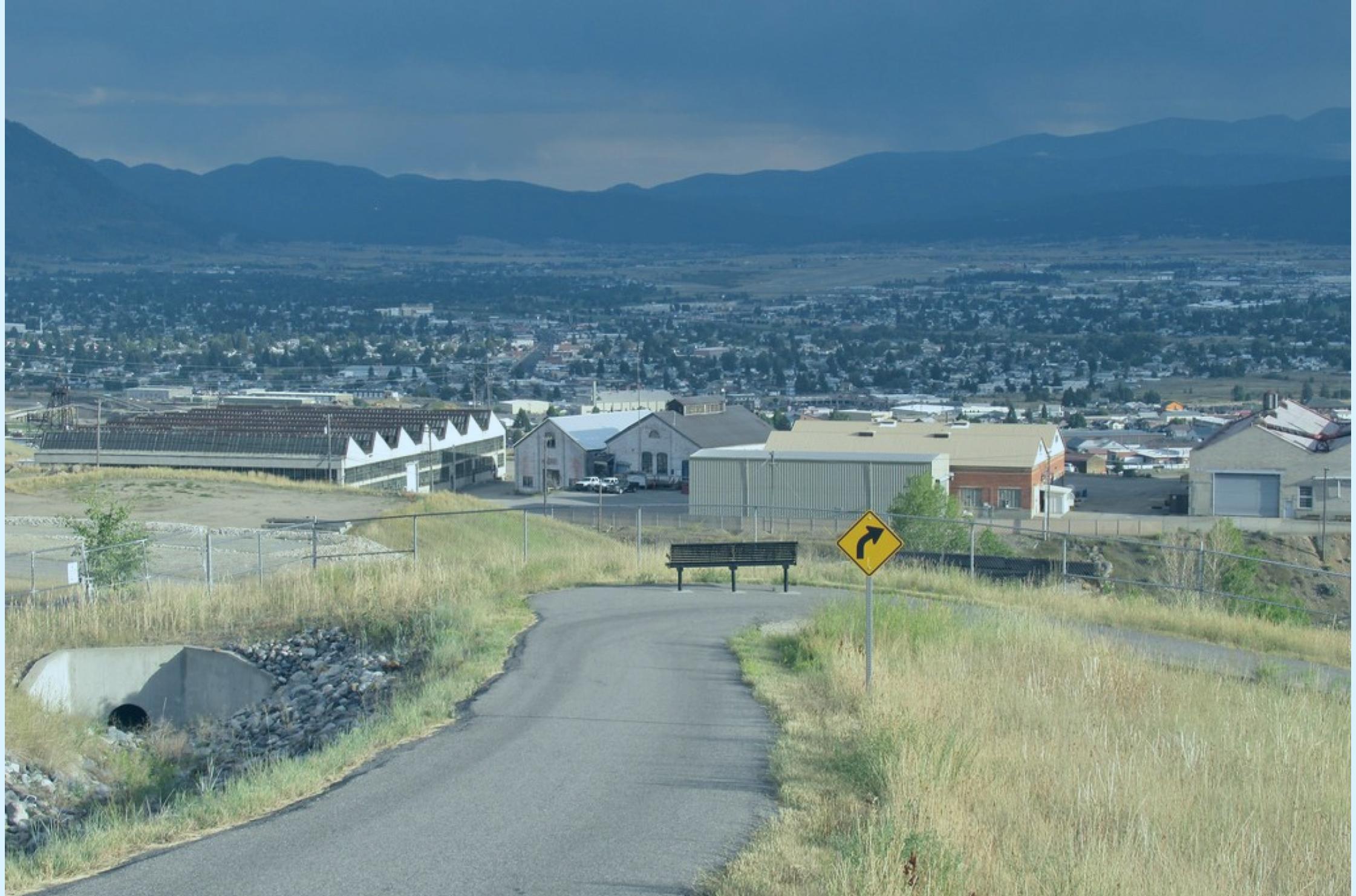 View approaching Butte, Montana with blue montains on the horizon